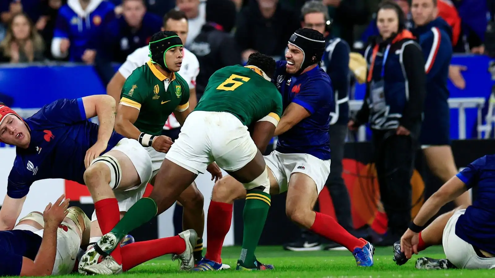 Kolisi in Sprinkbok Uniform tackling a French rugby player