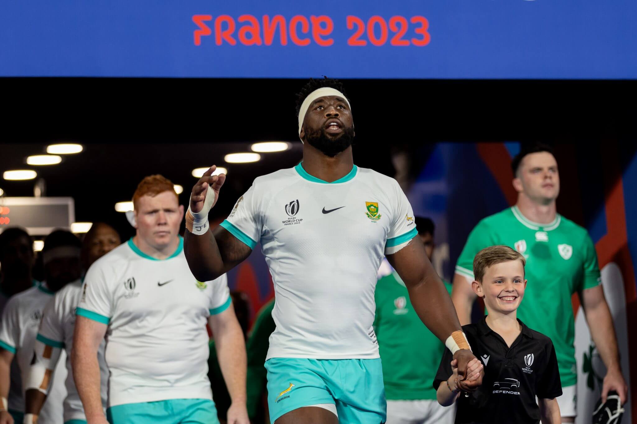 Kolisi in Springbok uniform leading the team out of the tunnel