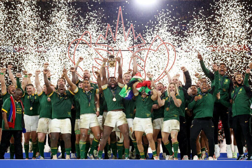 Kolisi in Sprinkbok Uniform celebrating with the whole team after winning the World Cup